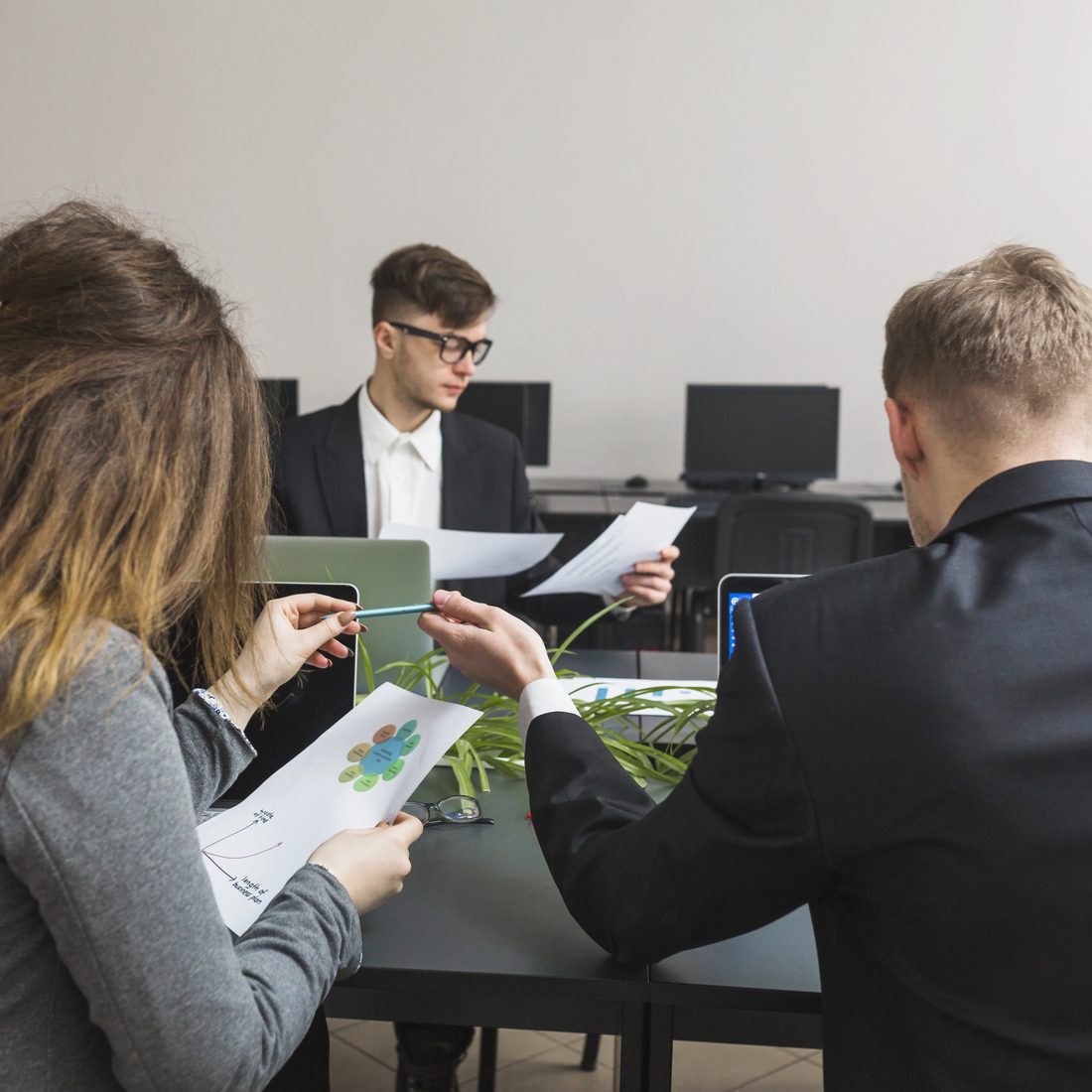 Consultants reviewing preparedness documentation